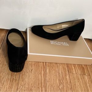 Black shoes with bejeweled chunky heels